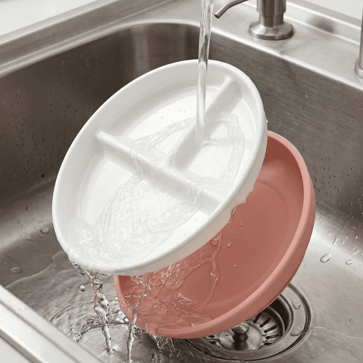 Ceramic divided plate with suction bottom being washed