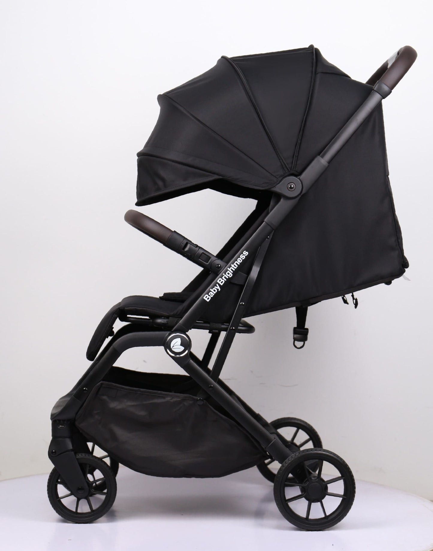 Baby Brightness SwiftGo lightweight compact stroller with i-Size infant capsule and Rotation ISOFIX base Black