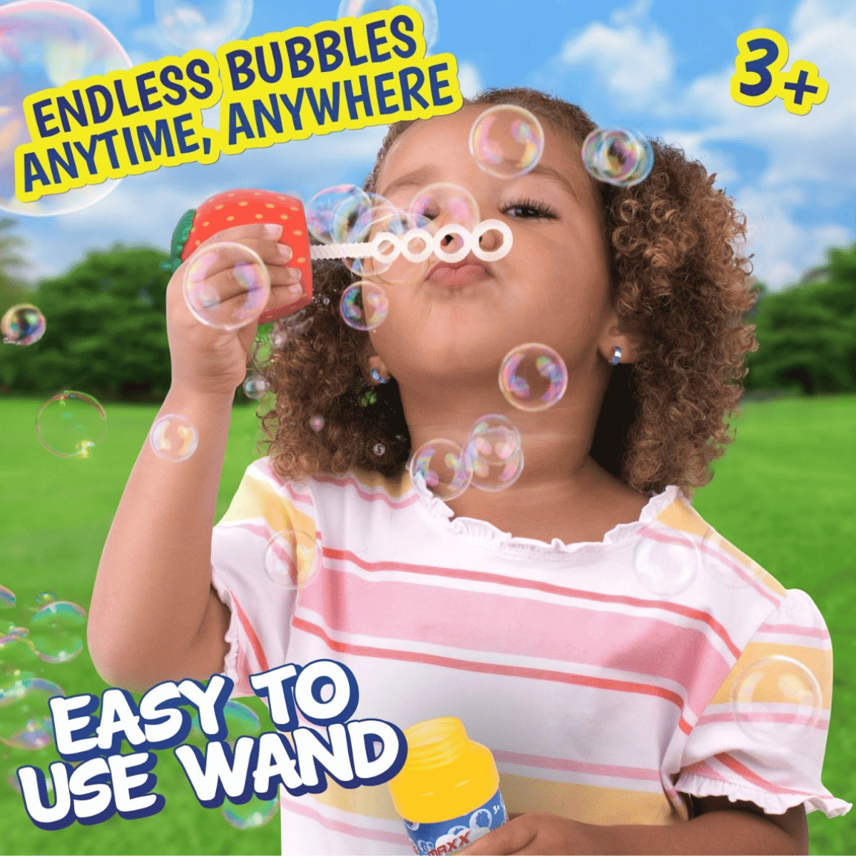 A young child outdoors blowing bubbles with a red and green bubble wand, holding a yellow bubble bottle. Large text overlays read 'ENDLESS BUBBLES ANYTIME, ANYWHERE' and 'EASY TO USE WAND,' with a '3+' badge in the top right.