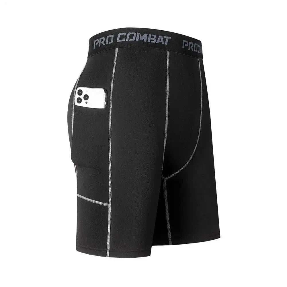 Black athletic shorts with 'Pro Combat' branding on a white background