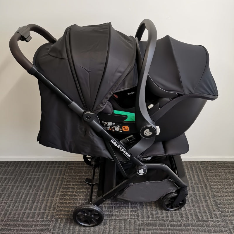 Baby Brightness SwiftGo lightweight compact stroller with i-Size infant capsule and Rotation ISOFIX base Black