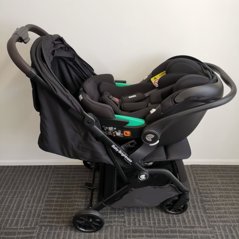 Baby Brightness SwiftGo lightweight compact stroller with i-Size infant capsule and ISOFIX base Black