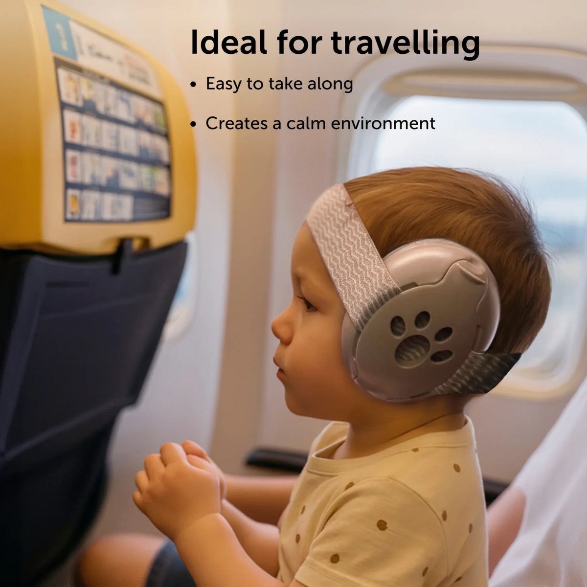 Child wearing ear protection headphones on an airplane with text about its benefits.