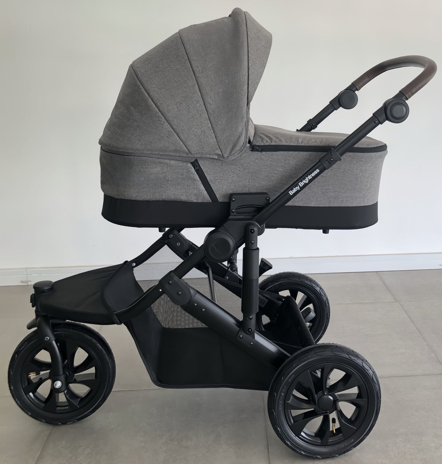 Baby Brightness easygo 1+ three wheel stroller with carrycot Grey