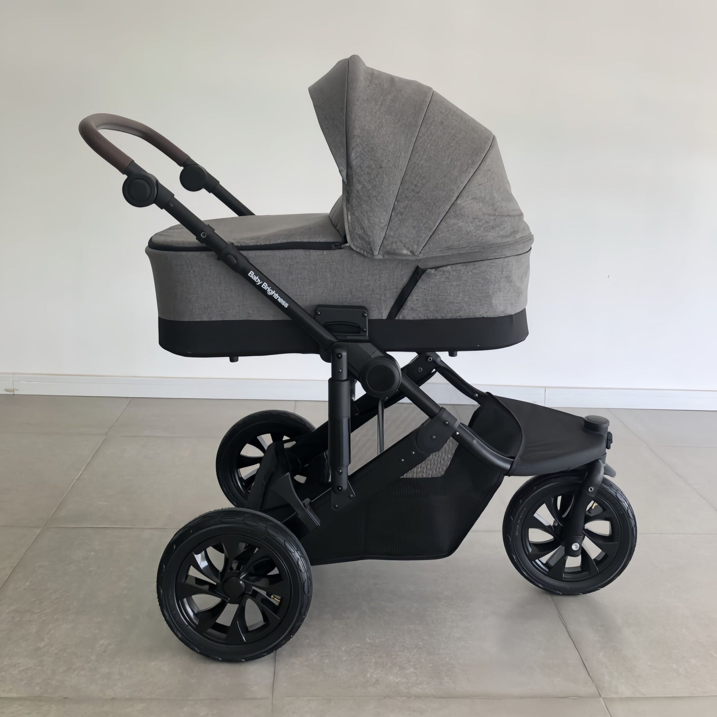 Baby Brightness easygo 1+ three wheel stroller with carrycot Grey
