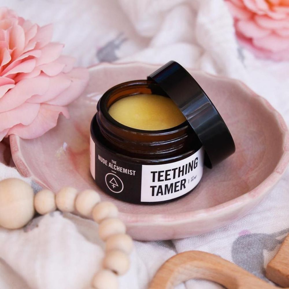 Teething Tamer Jar by The Nude Alchemist is great for organic pain relief for teething babies, kids, and adults. It is applied externally for comfort.