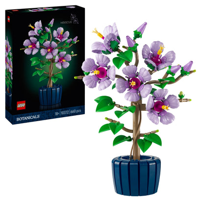 LEGO Botanicals set with purple flowers and green leaves next to its packaging