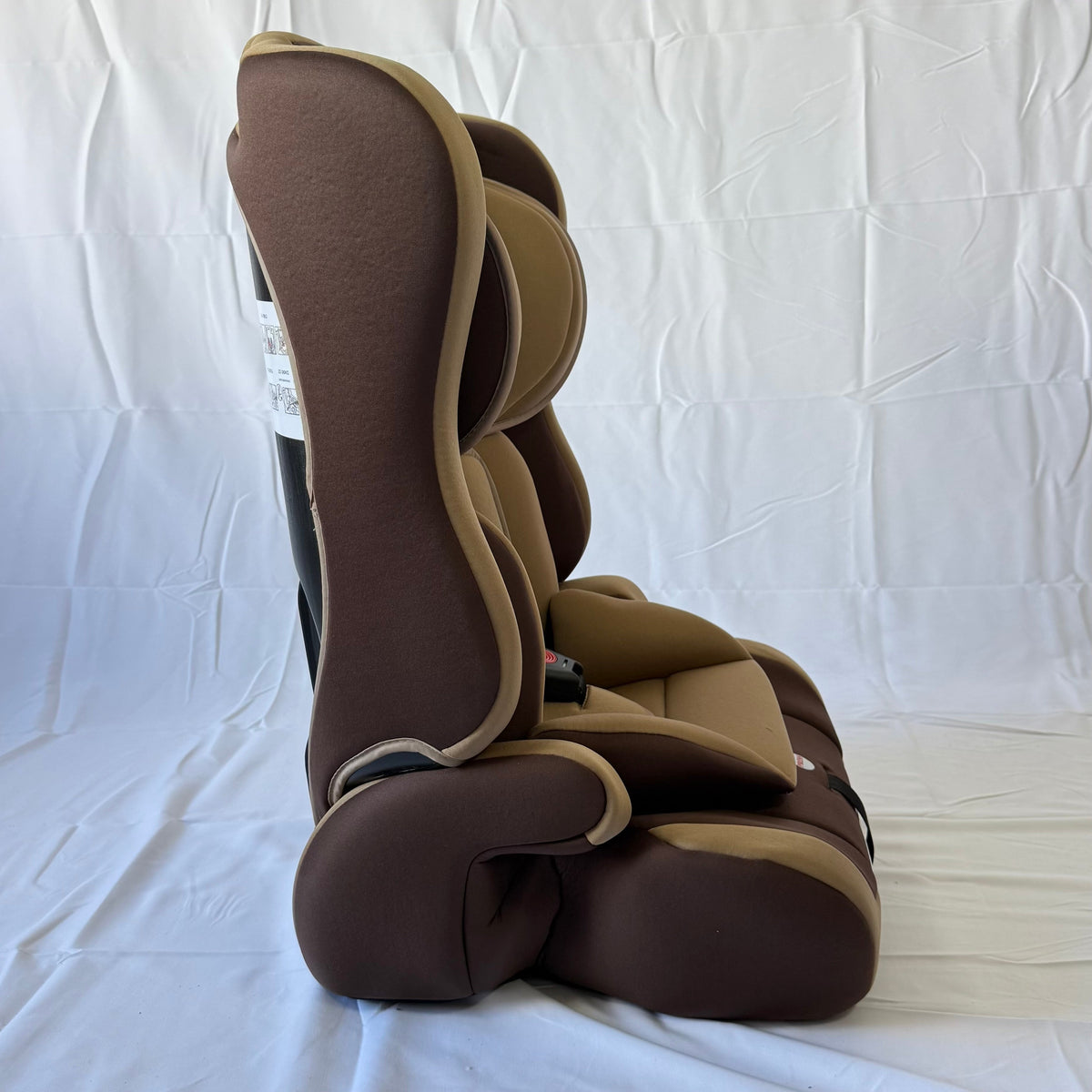 Arête Booster Car Seat 9M–12Yrs — Brown