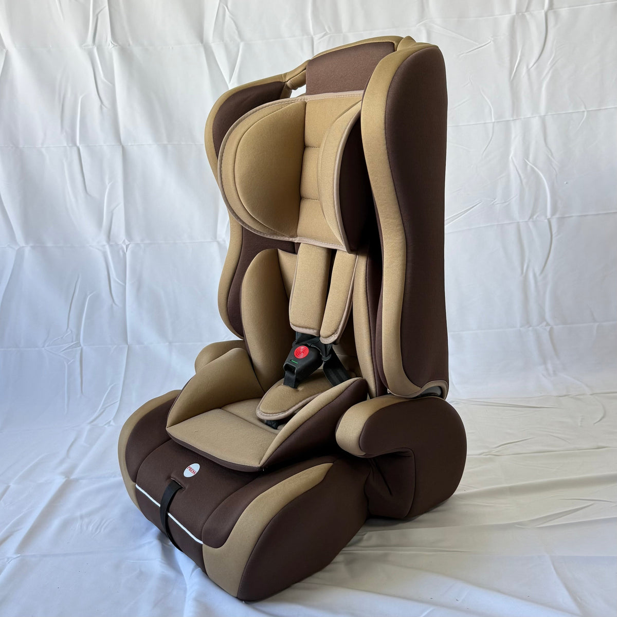 Arête Booster Car Seat 9M–12Yrs — Brown