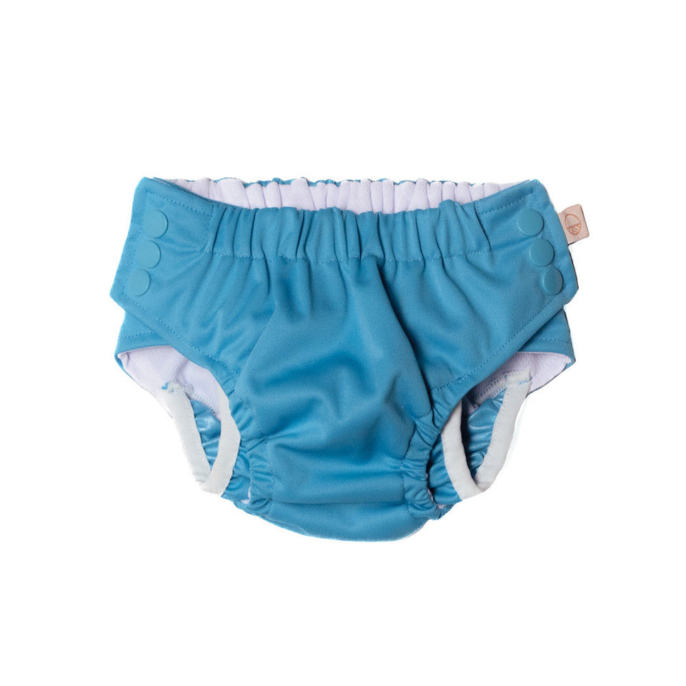 Blue baby swim nappies with white trim on a white background