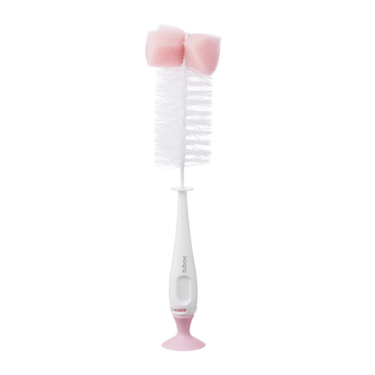 White and pink baby bottle cleaning brush on a white background