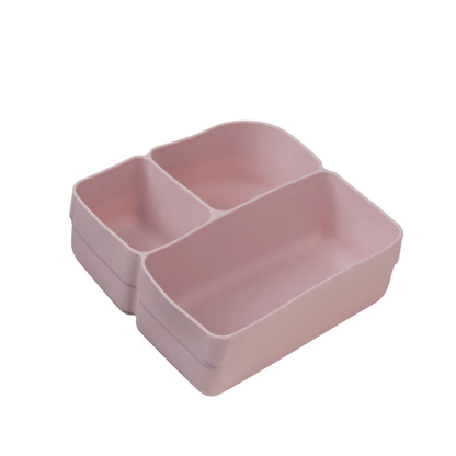 Pink divided dish on a white background