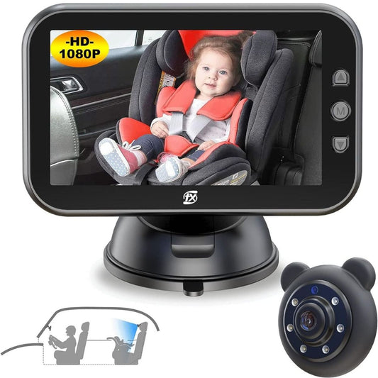 Baby monitor with screen displaying a child in a car seat, camera on the side.
