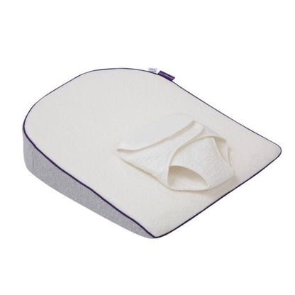 Cushion with a white cover on a white background