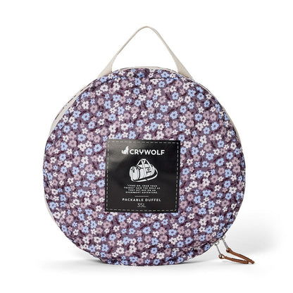 The Crywolf Packable Duffel folds into the end pocket of itself which makes it easy to pack away and keep neat in the room.