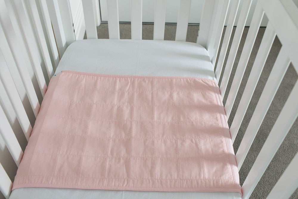 Cot Pad with Wings by Brolly Sheets – Pink or Space Galaxy White