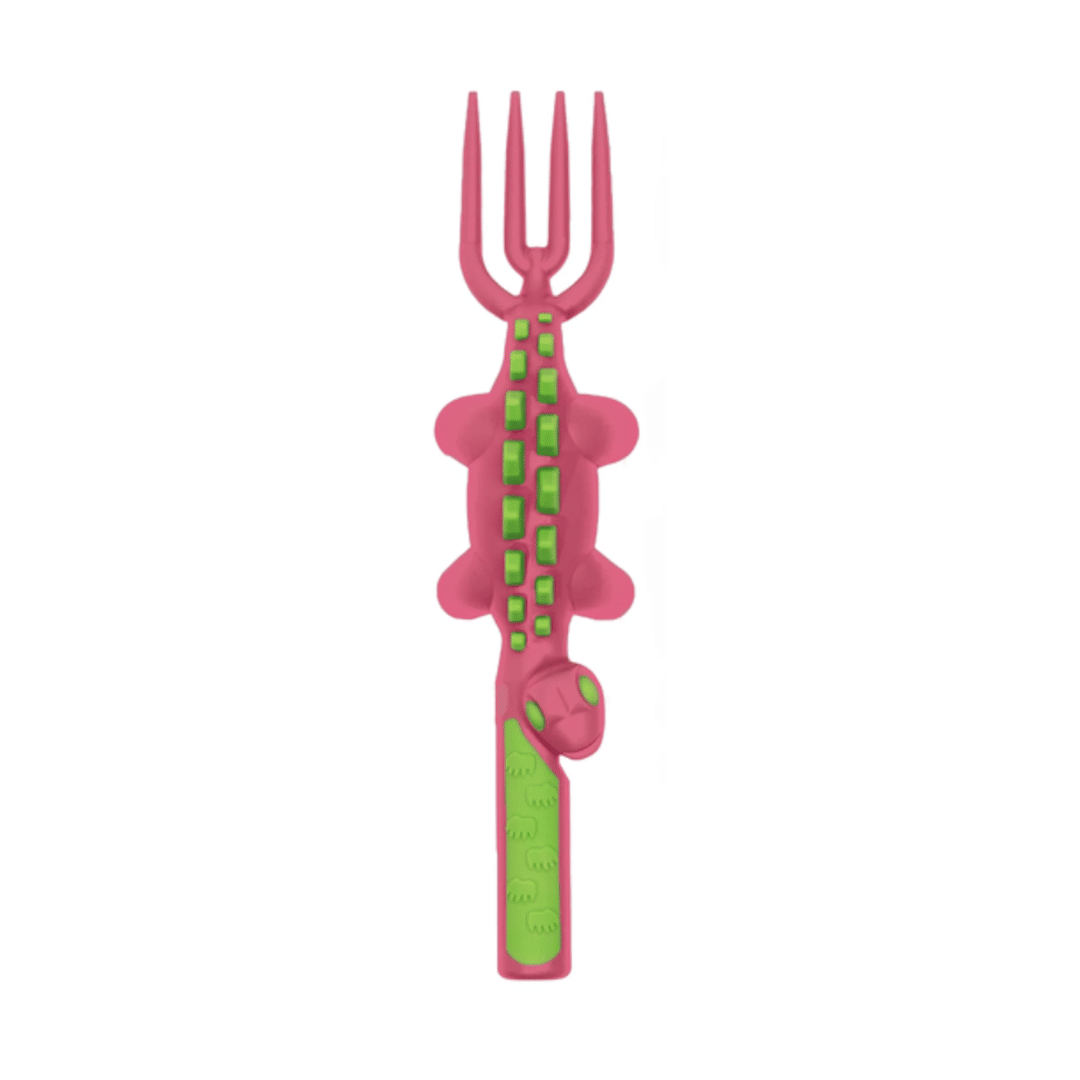 Pink children's fork with green handle shaped as dinosaur on a white background