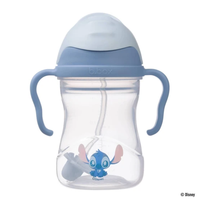 Clear sippy cup with blue handles and top, featuring a Stich cartoon character, on a white background.
