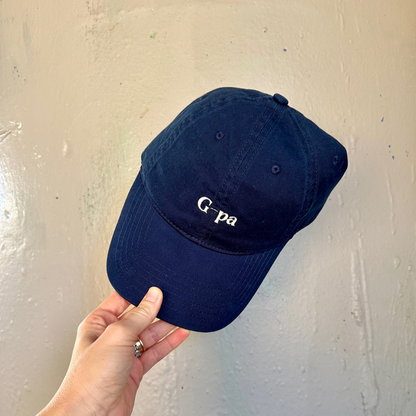 A dark blue hat for grandads. Has the writing 'G-Pa' in white on it.
