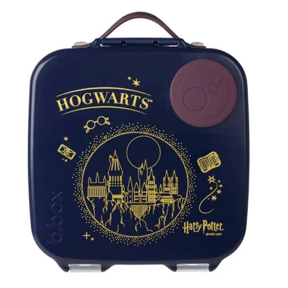 Navy blue suitcase with gold 'Hogwarts' and castle design, featuring a purple circular handle.