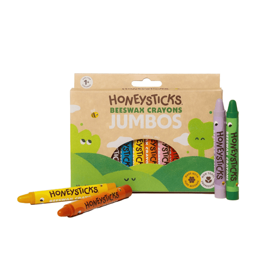 Honeysticks beeswax crayons in a box with colorful crayons displayed in front.