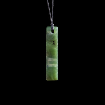 Small Wavy Jade Toki pendant handcarved by Elliot Lewis