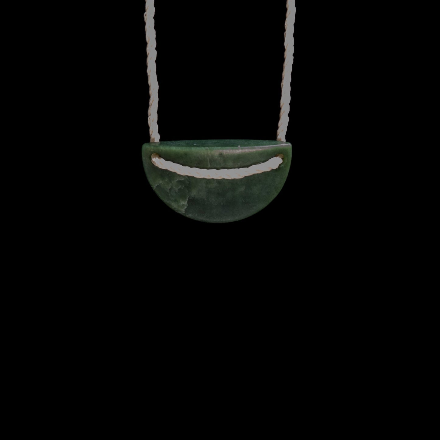 Small hand carved Jade Breast Plate style pendant by Madelyne Gourdin