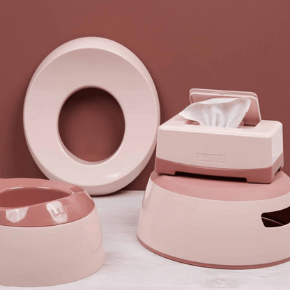 Pink wet wipes on a white surface with a pink background