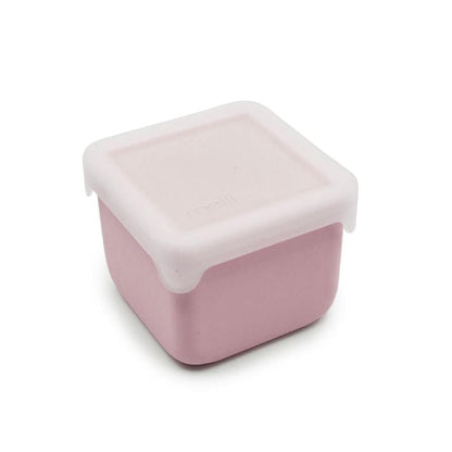 Pink container with a white lid on a white background