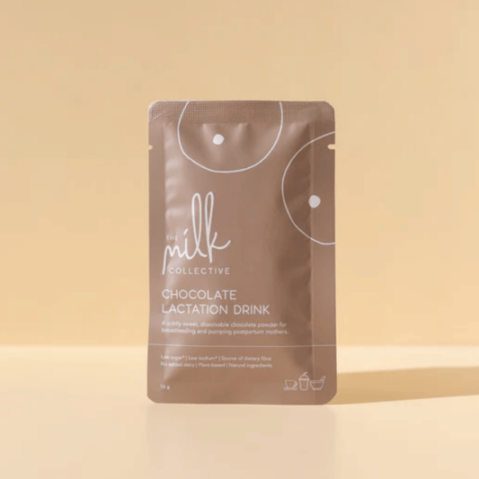 Chocolate lactation drink package from The Milk Collective on a beige background