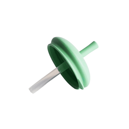 Green and white smoothie top on a white background
