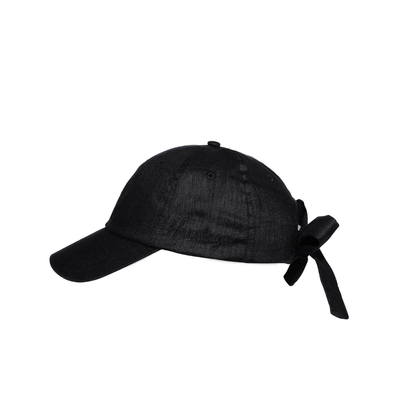 Black cap with a bow on a white background