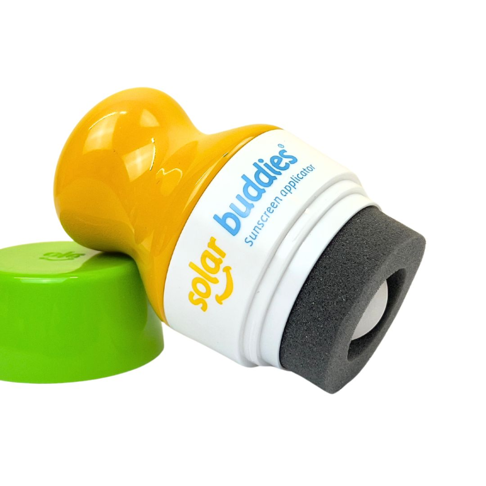 This green and yellow Solar Buddie is a refillable sunscreen applicator for kids and babies of any age. It's easy to use, no mess and perfect for outdoor fun and travel.