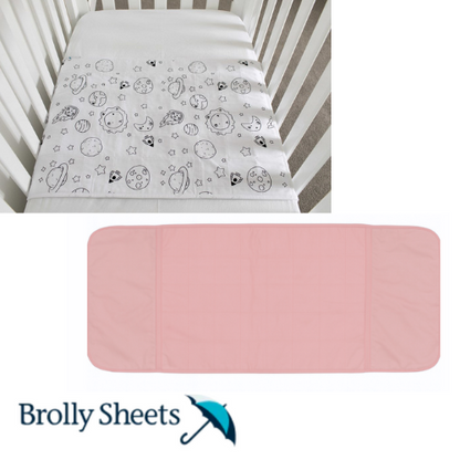 Cot Pad with Wings by Brolly Sheets – Pink or Space Galaxy White