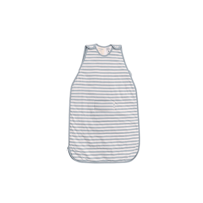 A sleeveless baby sleep sack with horizontal light blue and white stripes, featuring a small front pocket, shown against a plain white background.