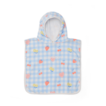A baby hooded towel with colourful fruits on a plain white background.