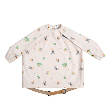 Baby bib with long sleeves and peppa  pig cartoon print on a white background