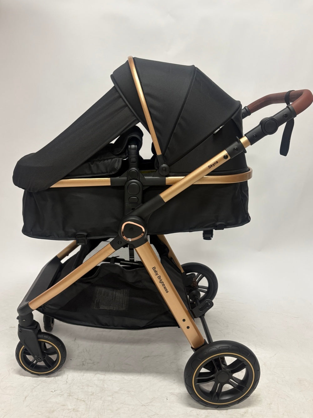 Pre-order Baby Brightness Newborn 4-in-1 Travel System with Bassinet, Capsule, ISOFIX Base & 360° Rotating Car Seat – Black/Gold