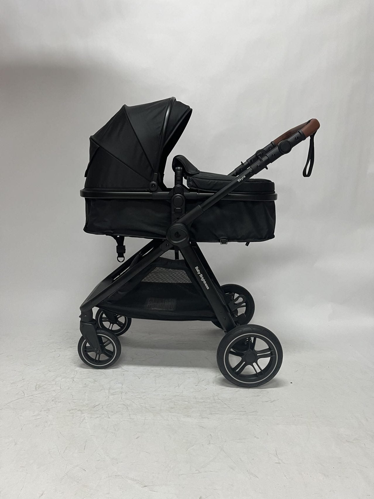 Skyra 2-in-1 Newborn Pram & Bassinet Stroller and Car Seat with Rotating ISOFIX Base (Black)